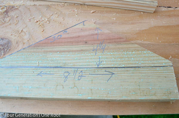 wooden mailbox roof dimensions written on pressure treated wood
