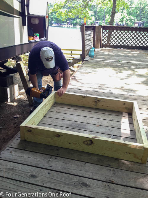 2x6 pressure treated wood box frame on a deck 