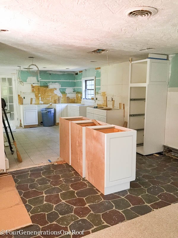 Our kitchen Renovation Series {installing new cabinets}