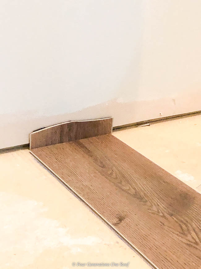 Click Together Installing Rigid Core Vinyl Flooring over Cement in Basement 
