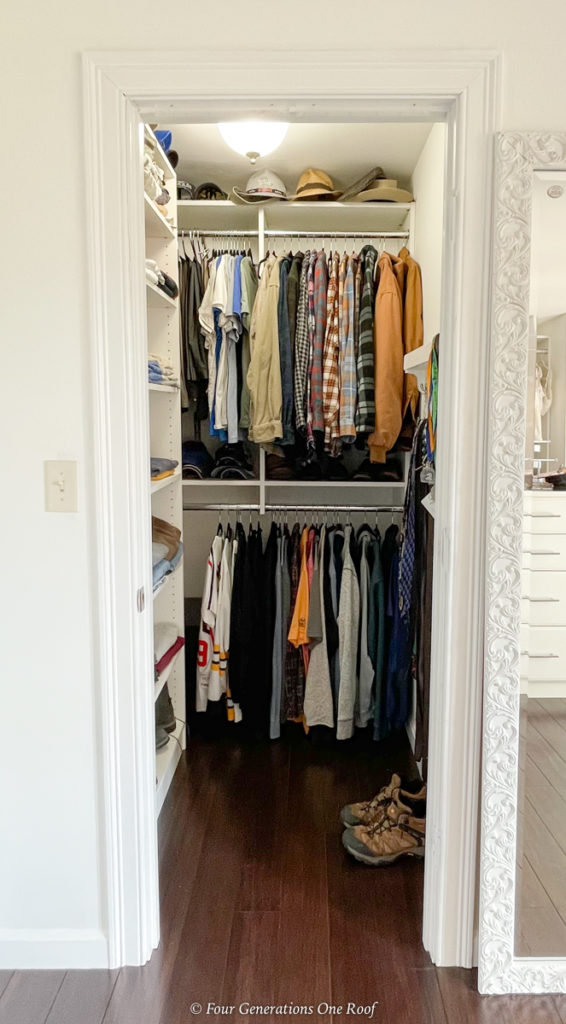 custom walk in closet with wood shelves