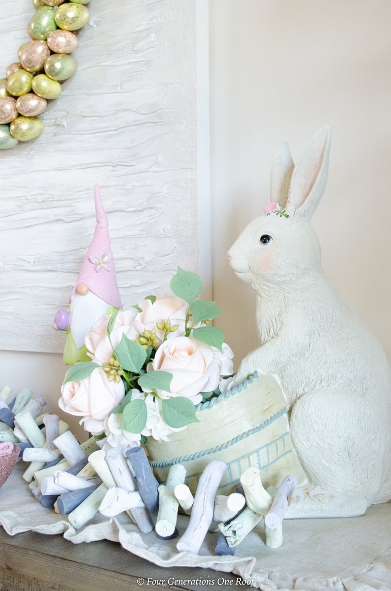 White ceramic Easter bunny planter with peach roses