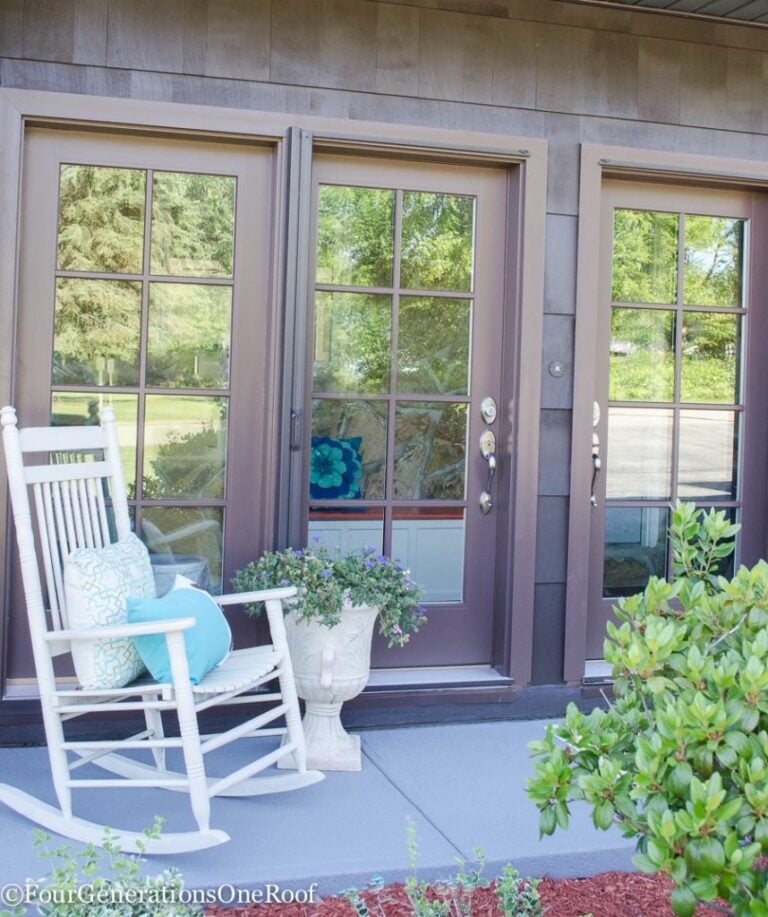 full view patio doors with brown grills, white rocking chair