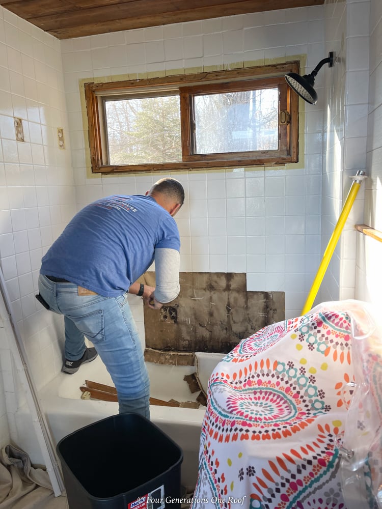 small bathroom remodel idea with a window in the shower