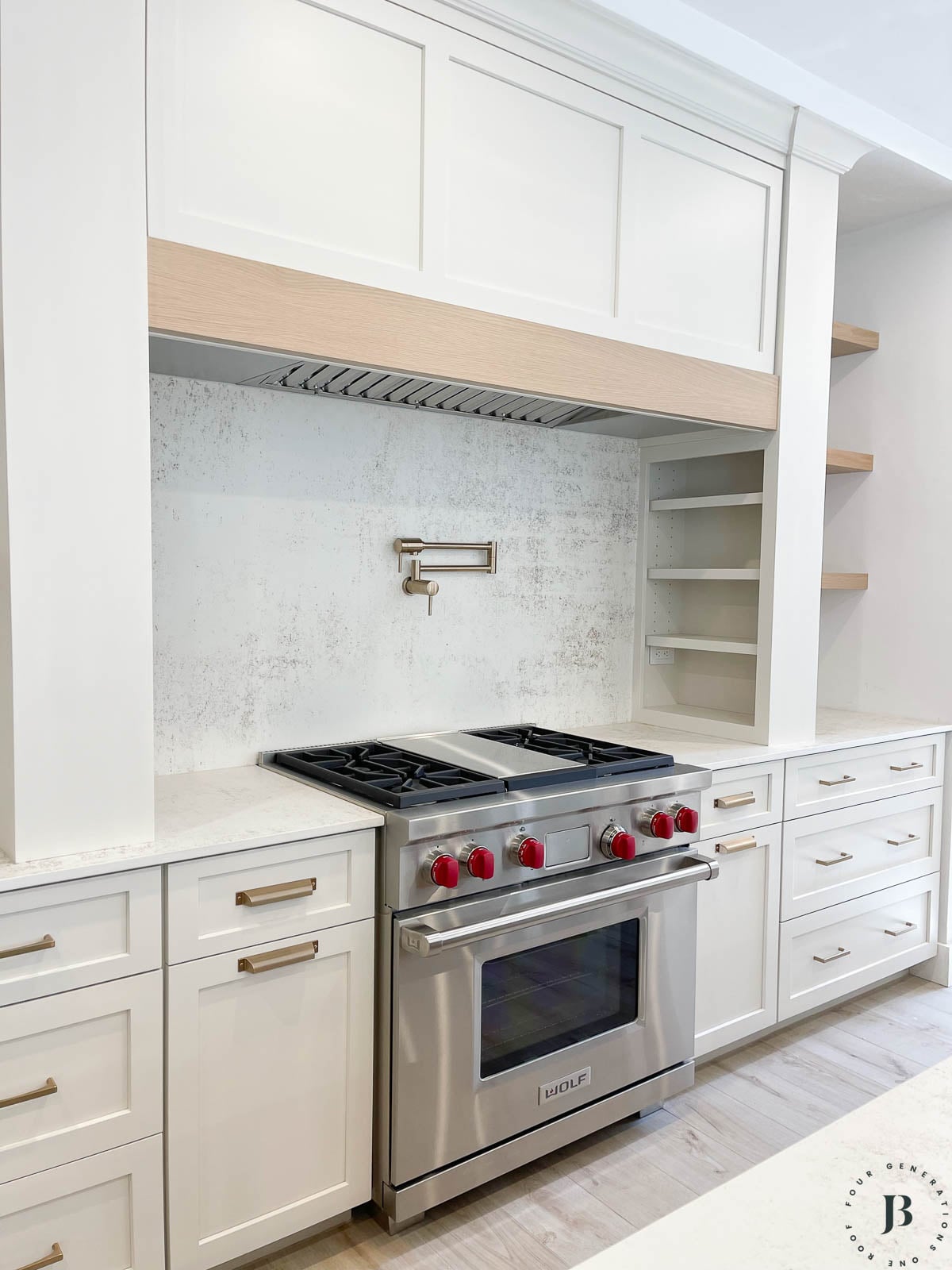 Dekton Nilium quartz backsplash behind cooktop