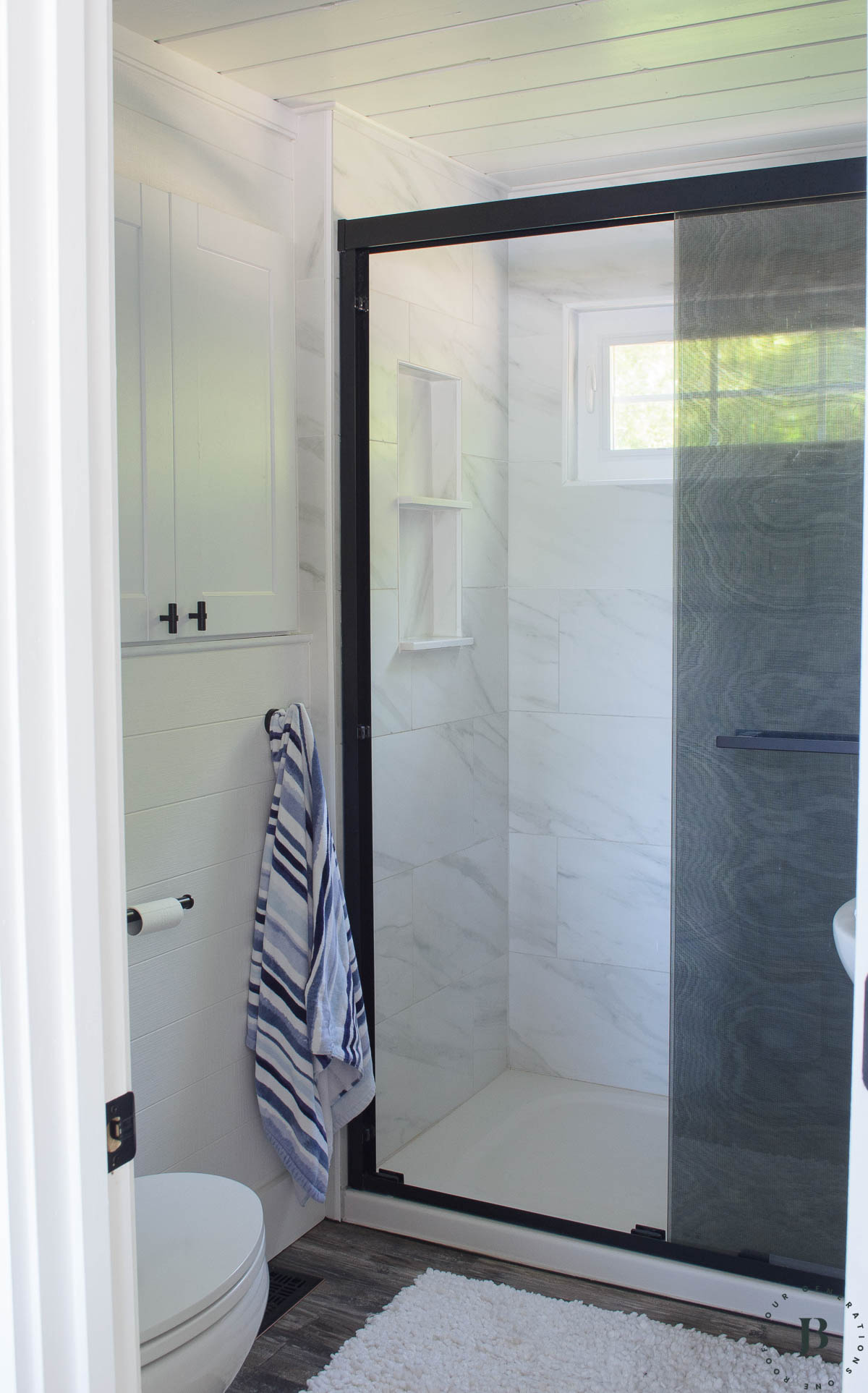 best lake house Airbnb vacation rental in New Hampshire with walk in shower and modern tile