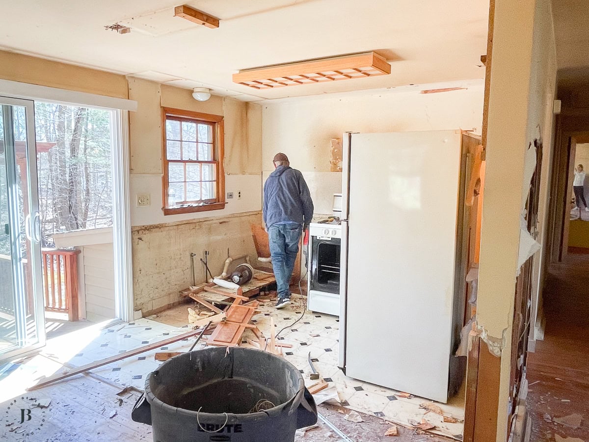 removing load bearing wall between kitchen and living room during renovation process