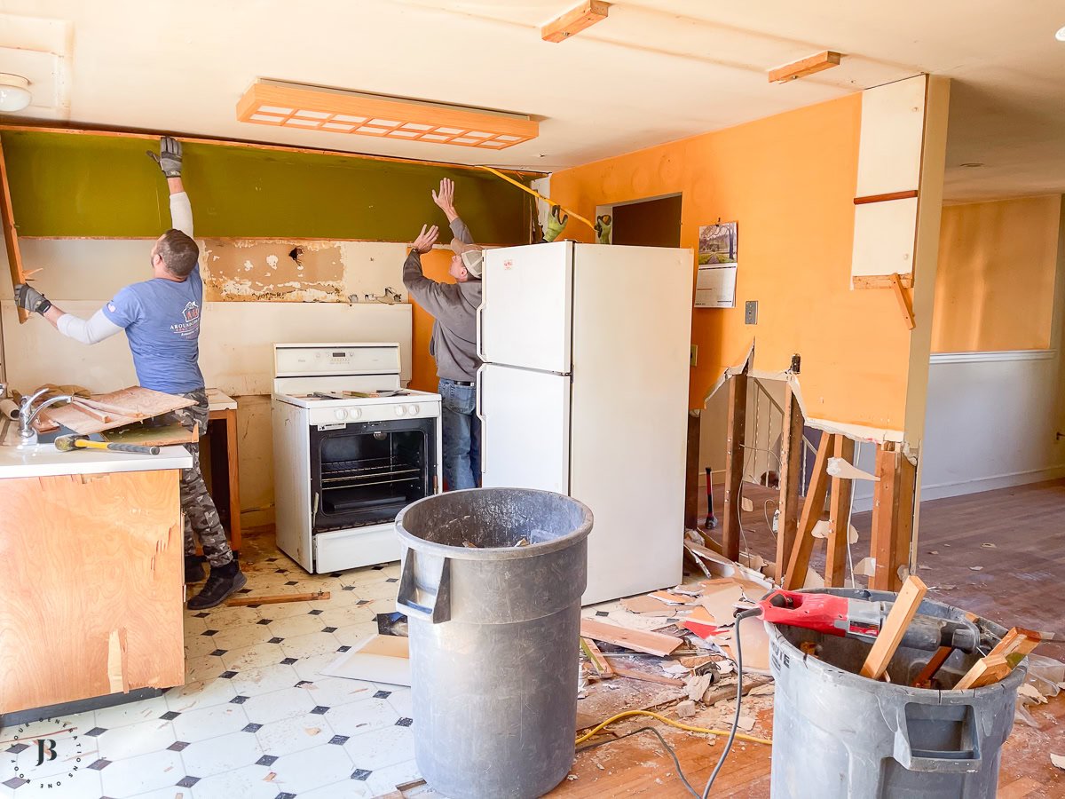 removing load bearing wall between kitchen and living room during renovation process