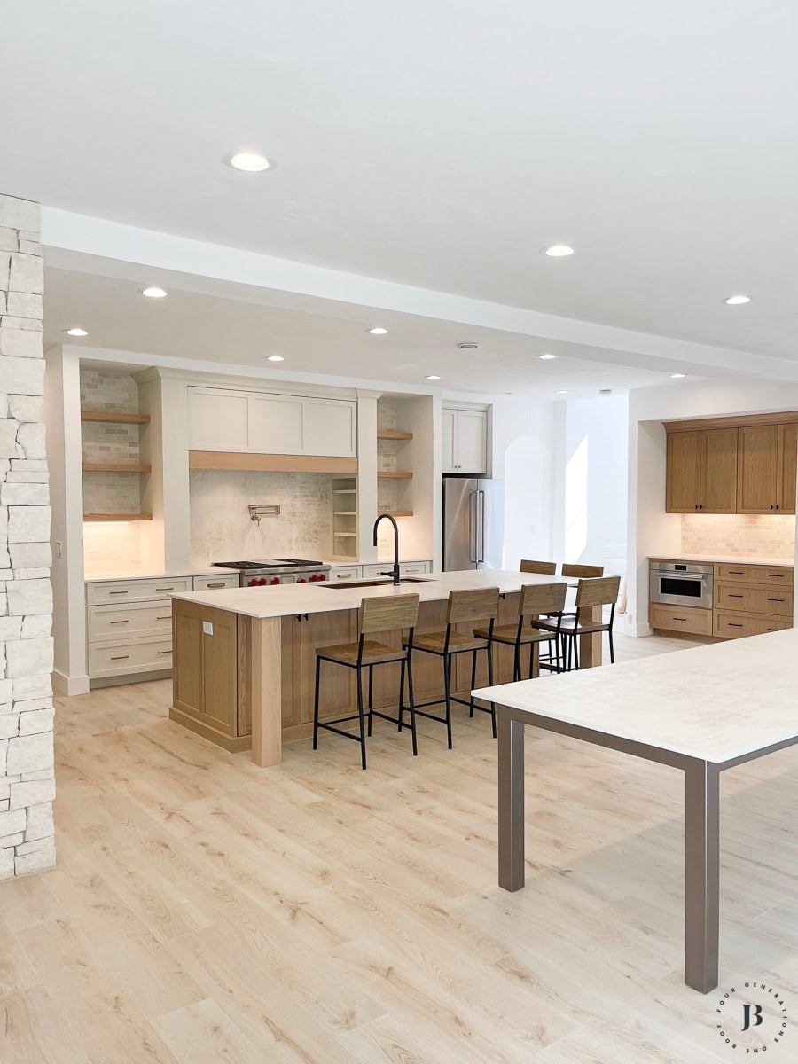 new build house ideas featuring a custom kitchen with white oak cabinets and painted white cabinets