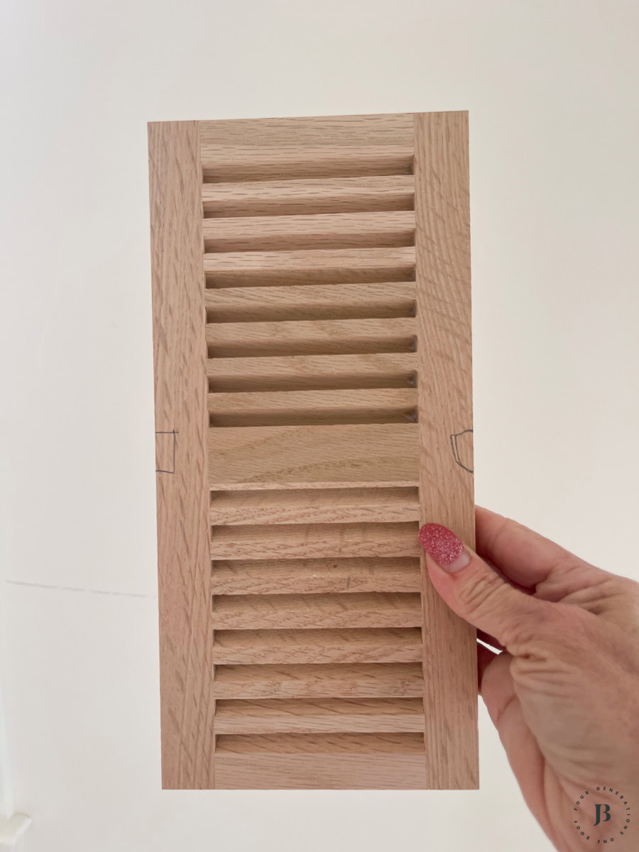 unfinished unstained wood floor vent cover before Bona Nordic Seal