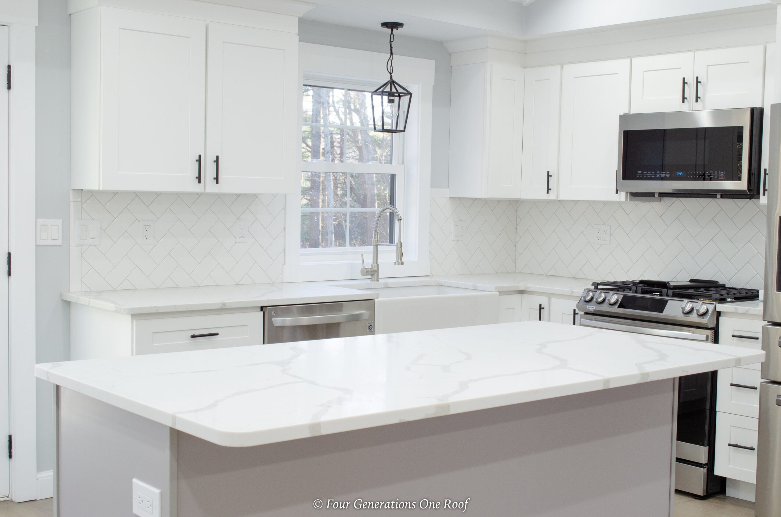 modern split level white kitchen with skylights 
