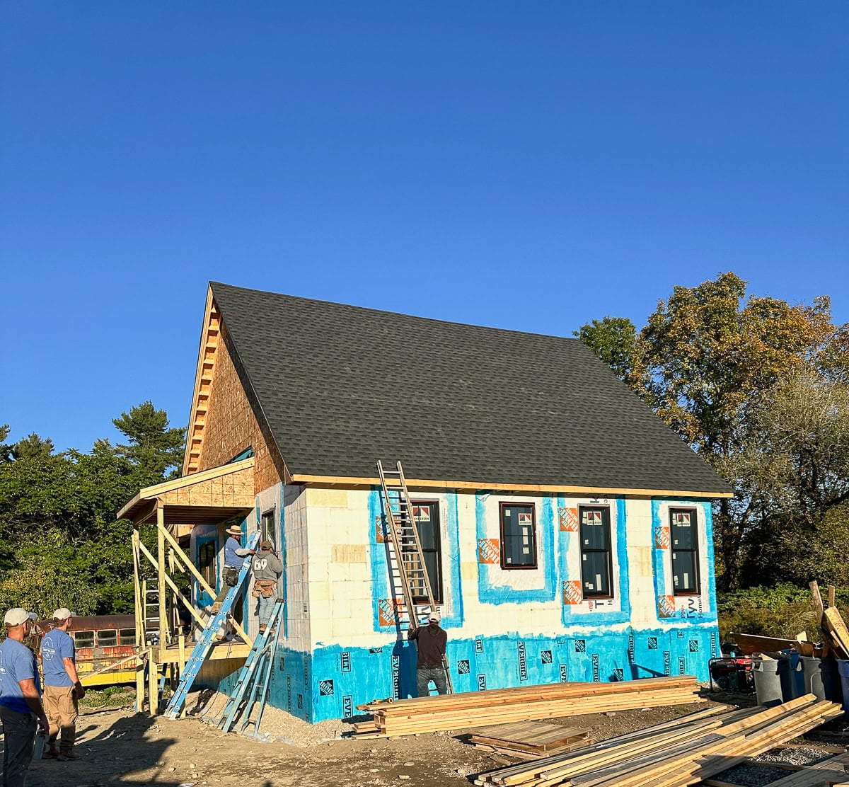 The multigenerational compound ADU with the roof on and the crew still working. 