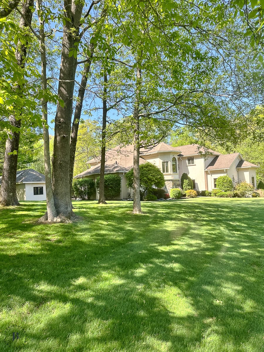 multigenerational house for sale modern mediterranean lush lawn and trees