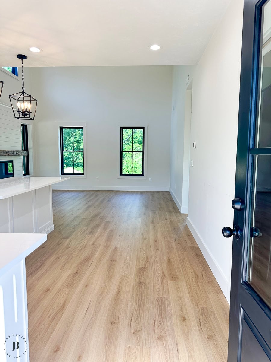 Finished 900 sq ft multigenerational ADU, real small ADU floor plan ideas open concept kitchen and living room