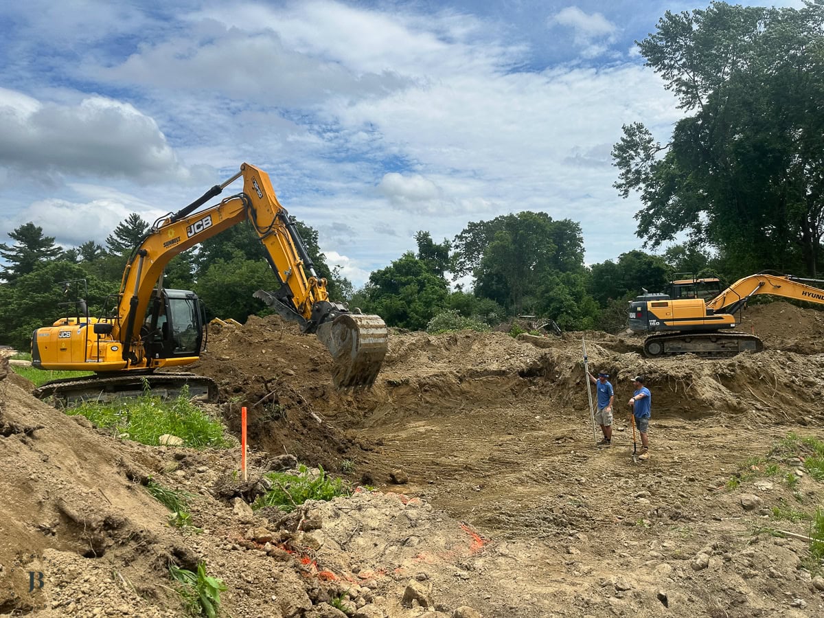 excavator digging the foundation footprint for a multigenerational main house build