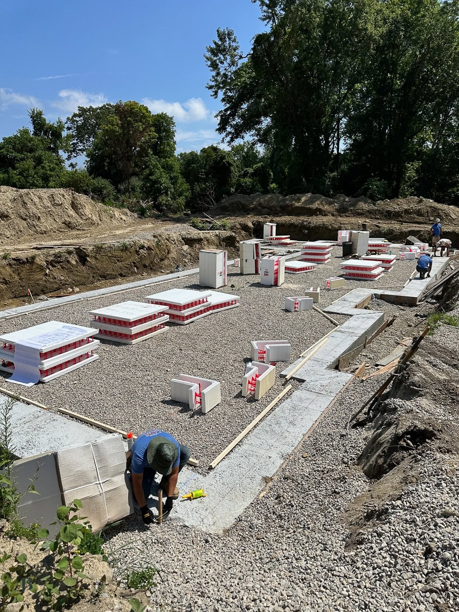 ICF foundation walls with crushed stone base prepared for the insulated slab