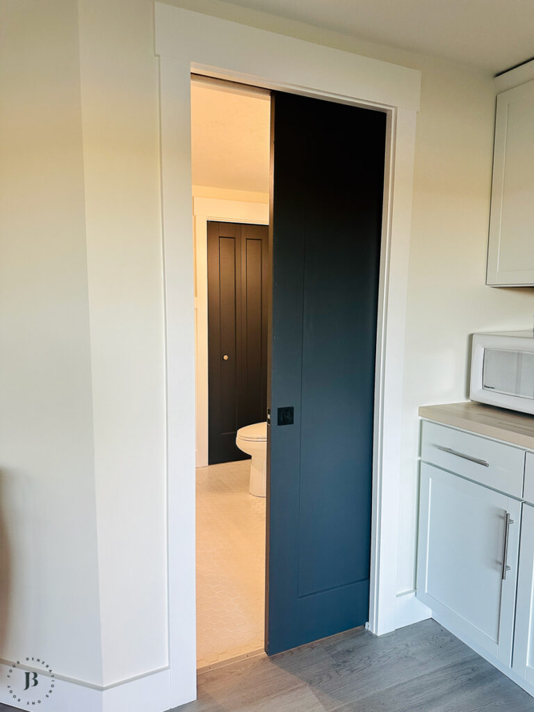 black pocket door bathroom