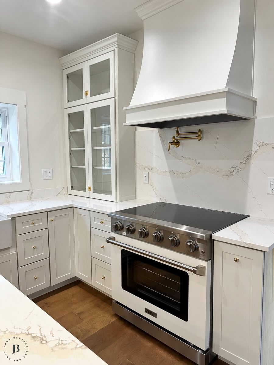 Kitchen hutch cabinet sitting on top of the countertop, an example of storage placed where it doesn't actually get used