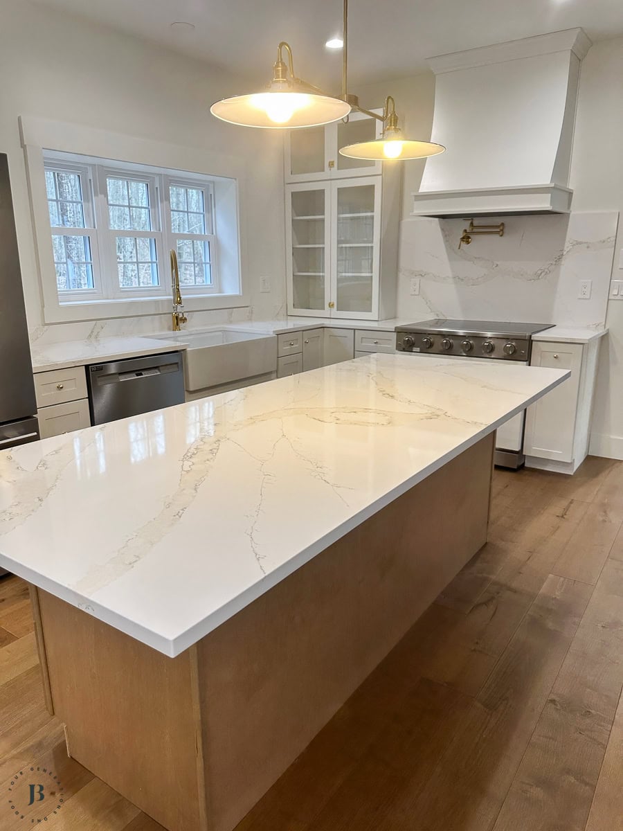 Modern farmhouse kitchen with a large island, one of the twelve kitchen layouts featured in this roundup