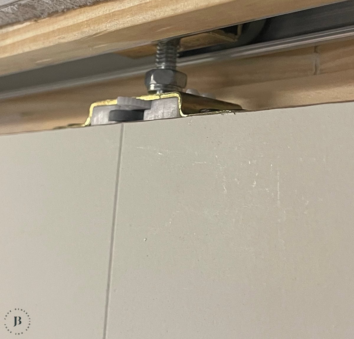 pocket door hardware on the top of the door slab