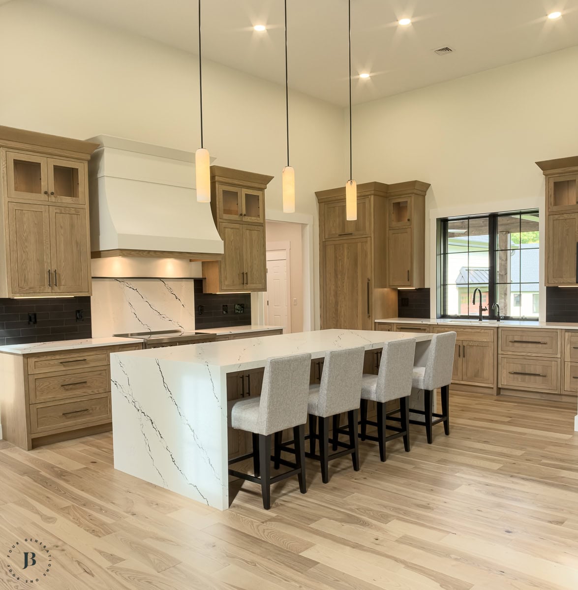 White oak kitchen cabinets with a large island, modern farmhouse kitchen at the multigenerational compound